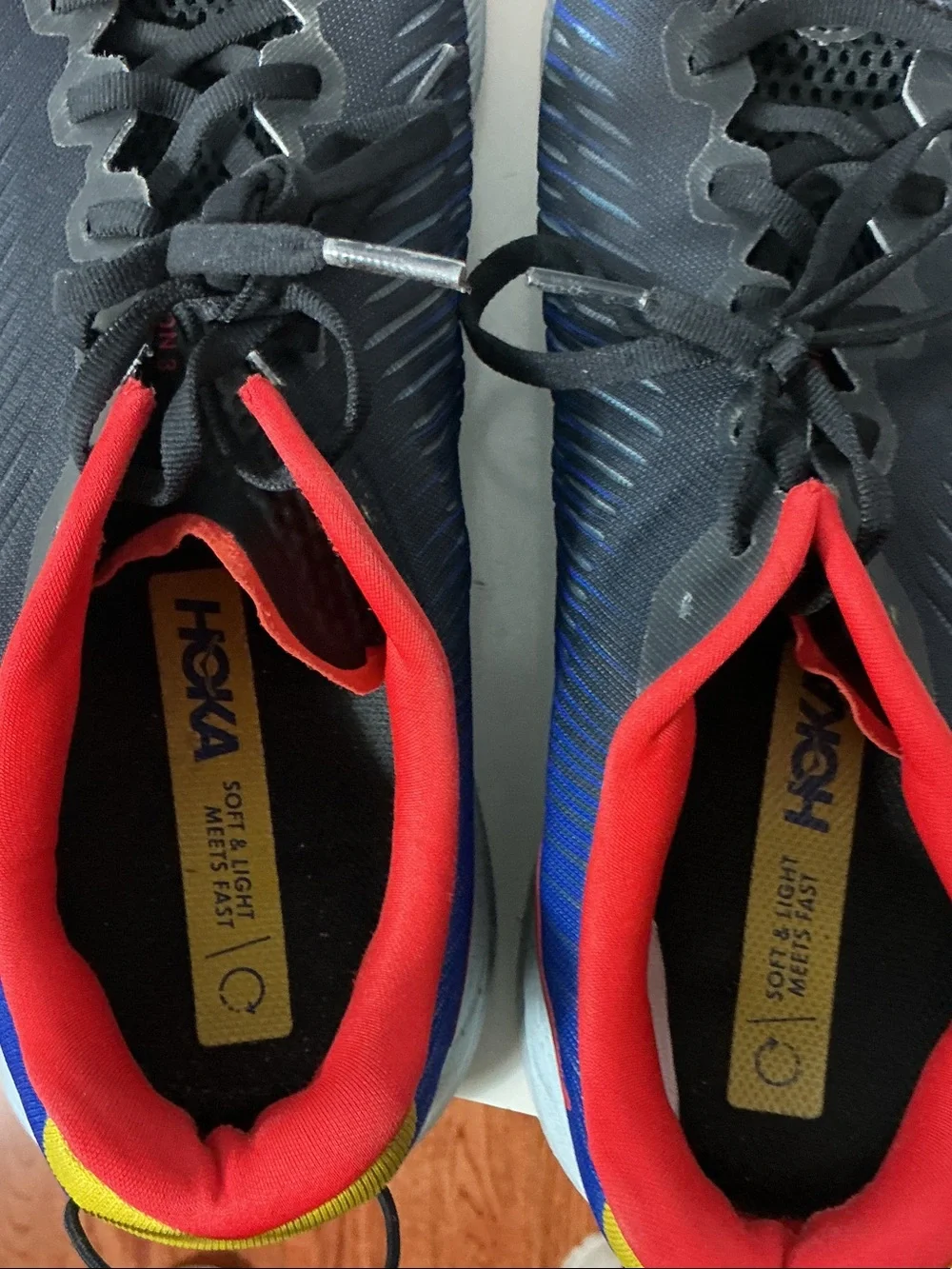Hoka Men’s Rincon 3 Black Running Shoes with Red and Blue Accents